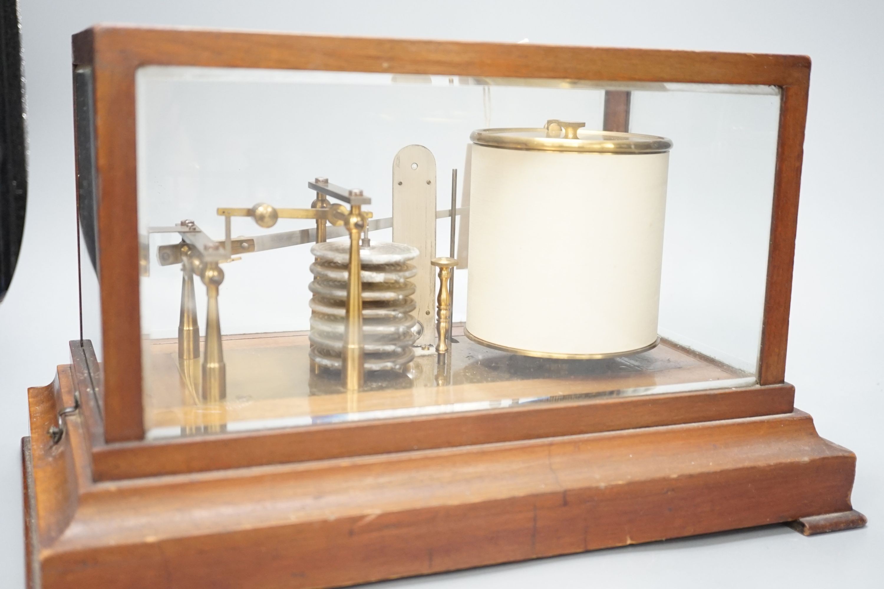 An early 20th century barograph in a mahogany case, 36 cms wide x 21cm high.